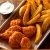 [Image: ¡Paga Q35 en lugar de Q61 por Combo Personal de 6 Alitas o 6 Boneless + Papas Wedge + Bebida con Refill!m]