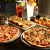 [Image: ¡Paga $15 en Lugar de $30.30 por 2 Pizzas Personales a Elección entre Hawaiana, Diávola, Margarita, Vegetariana, o Funghi + 1 Orden de Pan de Ajo con Queso Gratinado + 1 Tabla de Patatas con Salsa Barbacoa, Arrabiata y Mostaza Miel + 2 Bebidas!m]