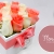 [Image: ¡Paga $17.50 en Lugar de $35 por Delicado Arreglo Floral con 12 Rosas de Color a Elección con Caja de Madera y Listón!m]