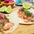 [Image: ¡Paga $13 en Lugar de $24 por 2 Órdenes de Tacos de Camarón o Pescado de Especialidad a Elección + 1 Orden de Nachos (Tambonachos) + 2 Sodas o Bebidas Naturales! ¡Solo 503 Cupones Disponibles!m]