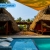 [Image: ¡Paga Q549 en Vez de Q999 por Estadía para 2 Personas en Cabaña Tipo Hawaii con Baño Privado + 2 Cócteles de Bienvenida + Uso de Instalaciones: Tapetes de Playa, Piscina, Hamacas y Más!m]