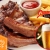 [Image: ¡Paga $12 en lugar de $24 por 2 órdenes de Baby Back Ribs (1/2 rack) + 2 cervezas nacionales o 2 sodas en Jerzey Boys Bar &amp; Grill!m]