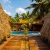[Image: ¡Paga Q549 en Vez de Q999 por Estadía para 2 Personas en Cabaña Tipo Hawaii con Baño Privado + 2 Cócteles de Bienvenida + Uso de Instalaciones: Tapetes de Playa, Piscina, Hamacas y Más!m]