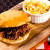 [Imagen:¡Paga Q50 en lugar de Q100 por 2 Sándwiches Premium a Elección entre Pulled Pork o Pulled Chicken + Complemento de Cole Slaw (Ensalada de Repollo) o Ensalada de Papa!]