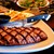 [Imagen:¡Paga $ 29.95 en Lugar de $59.95 por Parrillada para 4 que Incluye: 1 Entrada Texas Tonions + 2 Churrascos (8 Oz. c/u) + 2 Cuadriles de Pollo (8 Oz. c/u) + 4 Chorizos + Guarniciones + 4 Sodas o Té Helado!]