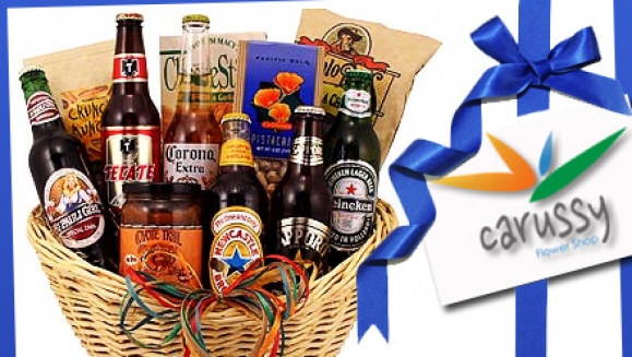 [Image: ¡Paga $25 en lugar de $50 por una canasta navideña de regalo “vuelta al mundo”, que incluye: 6 cervezas importadas, semillas, panitos, palitos de queso y salsa dip con envío gratis en Carussy!m]