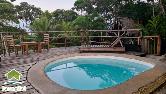 [Image: ¡Estadía Paradisíaca en el Caribe! ¡Paga Q325 en vez de Q650 en Estadía para 4 Personas en Cabaña con Aire Acondicionado + Uso de Instalaciones: Piscina, Playa Privada, Jacuzzi y Más en Punta de Palma!m]