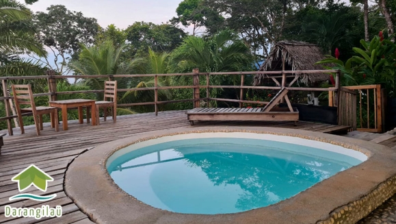 [Image: ¡Estadía Paradisíaca en el Caribe! ¡Paga Q325 en vez de Q650 en Estadía para 4 Personas en Cabaña con Aire Acondicionado + Uso de Instalaciones: Piscina, Playa Privada y Más en Punta de Palma!m]