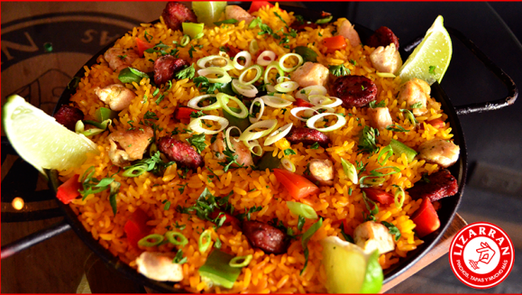 [Image: ¡Paga $18 en Lugar de $36 por Menú para Llevar que Incluye: 1 Paella de Carnes para 2 Personas + 1 Botella de Vino Sol de Chile, Merlot o Cabernet!m]