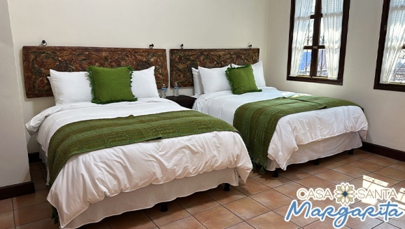 [Image: ¡Paga Q599 en lugar de Q1,189.50 por Estadía Familiar en Antigua para 2 Adultos y 2 Niños (Hasta 9 años) en Habitación Doble, TV, Parqueo, Impuestos Incluidos y Más!m]